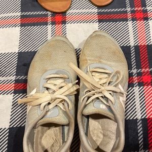 Well worn new balance tennis shoes
